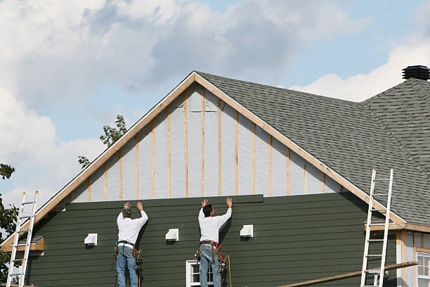 Professional Siding technician working in Milton, WV